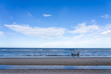 Fototapeta na wymiar Landscape of Ocean and Blue Sky with Boat in Summer
