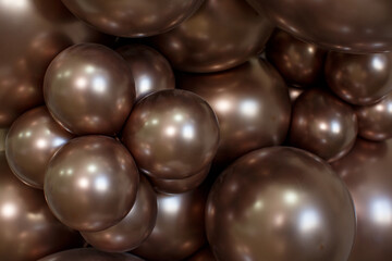 Background of brown-bronze inflatable gel balloons
