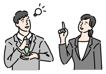 ひらめいているスーツを着た男女
