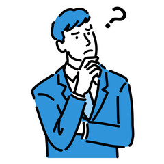 腕を組んで考えているスーツを着た男性
