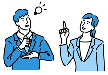 ひらめいているスーツを着た男女
