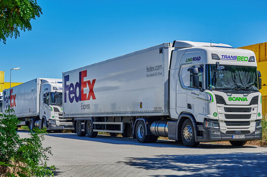 Grossbeeren, Germany - June 21, 2022: View to a FedEx logo near the dispatch center of the global logistic company.