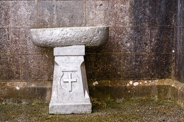 Holy water font outside a church.