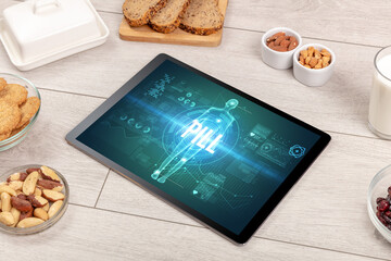 Tablet Pc with fruits, medical concept