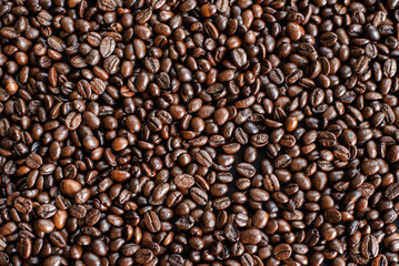background of mountain of close up coffee beans