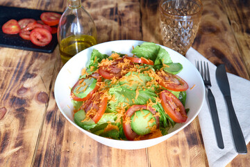 Fresh salad on a white bowl, healthy food
