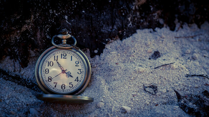 Vintage watch on Beach, sad and lonely concept.
