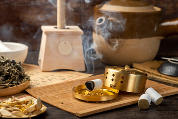 Background of moxibustion and Chinese herbal medicine