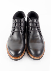 Male black leather boot on white background, isolated product. Differentiated footwear and exclusive design.
