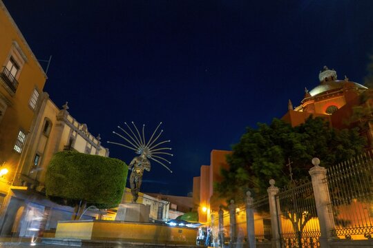 Statue and fountain of Danzante Conchero Chichimeca in Queretaro, Mexico