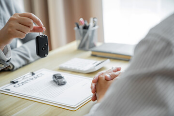 Businessman agent meeting customer with insurance policy about car contract.Salesman Automobile Vehicles Concept