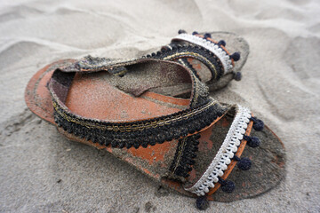 bohemian sandals filled with beach sand