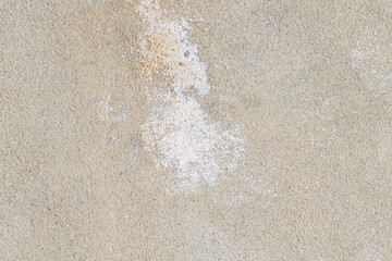 Cement wall with stained textured weathered surface. Abstract background