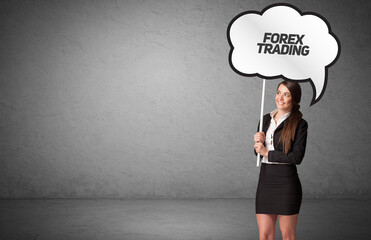 business person in casual holding road sign
