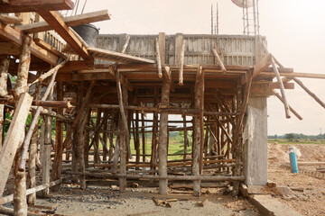 Fototapeta premium Concrete beam formwork and supporting the beam on construction site.