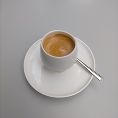 White cup of coffee.