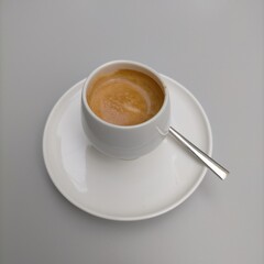 White cup of coffee.