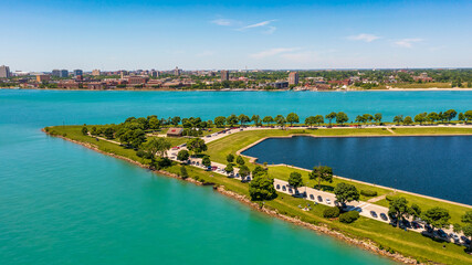 Fototapeta na wymiar An aerial view of the Western tip of Belle Isle Park, looking beyond this is the Southern shore of the Detroit Riverfront. 