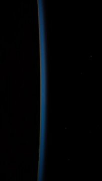 Sunrise from space on earth astronomy background vertical video for social media based on image by Nasa