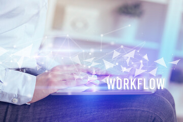 Close up hands using tablet