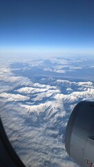 飛行機からの山々の景色
