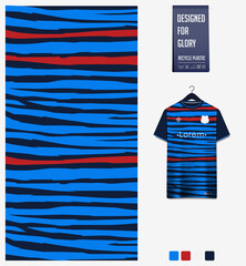 Soccer jersey pattern design. Vertical stripes ethnic pattern on navy blue background for soccer kit, football kit, sports uniform. T-shirt mockup template. Fabric pattern. Abstract background. 