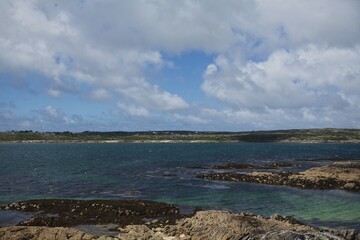 travel life in Ireland, ocean and sky. Street and animals. Green and blue. Water. Mountains. Clouds.
