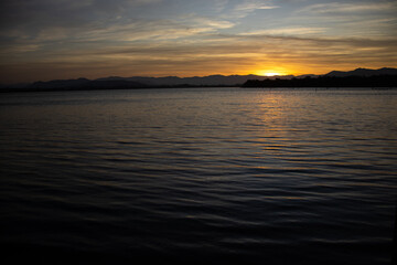 Obraz premium Sunset on the lagoon in Ibiraquera Imbituba, Santa Catarina SC 