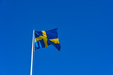 Swedish flag in blue with yellow cross