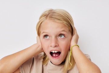 Positive little girl hand gesture fun fashion on a light background