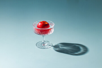 summer coctaile still life on sunny blue background wirh shadows