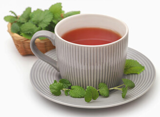 Lemon balm leaves with herbal tea