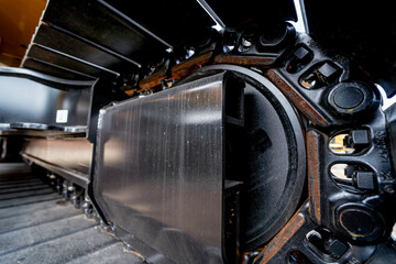 Details of hydraulicheavy duty equipment vehicle on display area of dealership