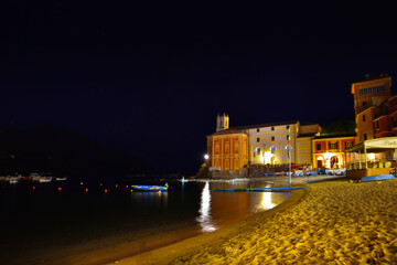 Fototapeta na wymiar night view of the famous Ligurian beach La Baia del Silenzio