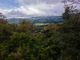 Beautiful aerial view of a Lagoon in the middel of the mountains near Santa Maria de dota in Costa Rica