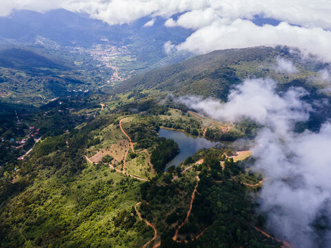 Beautiful aerial view of a Lagoon in the middel of the mountains near Santa Maria de dota in Costa Rica