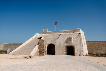 Walls of the fortress of Sagres, next to the sea protected against attacks by a wall and 3 natural cliffs