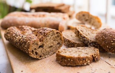 fresh loaf of bread on wooden board