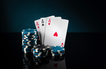 Successful win with three aces playing cards. Poker game with three of a kind or set combination