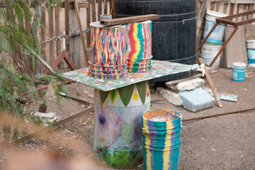 Colorful painted buckets in the workplace