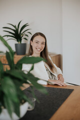 Young woman in the home office