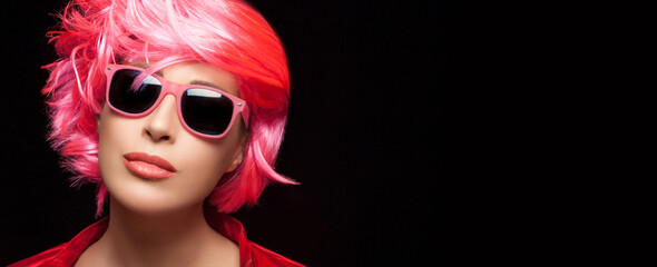 Fashion model girl with stylish pink hair. Dyed hair and fashion concept