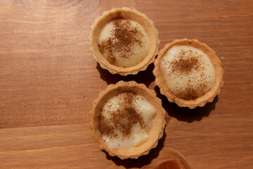 A close up view of a milk tart traditional south african desert - obrazy, fototapety, plakaty
