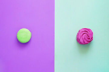 Pop Art. Macaron and marshmallows on colored backgrounds