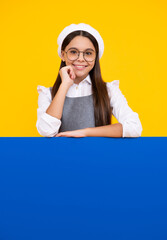 Teenage girl holds a blank for notification informing. Advertisement and sale. Markets and shops sales concept, blank board for copy space. Happy face, positive and smiling emotions of teenager girl.