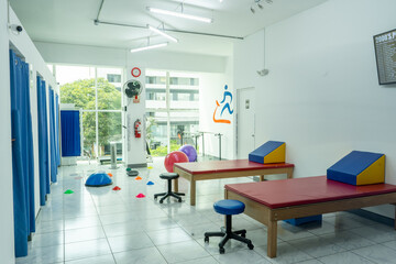 Photographs of a physical rehabilitation center inside a health clinic.