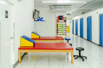 Photographs of a physical rehabilitation center inside a health clinic.