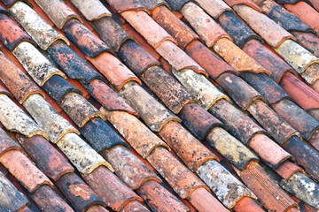 old, damaged and dirty roof tiles