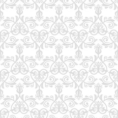 Obraz premium Classic seamless vector pattern. Damask orient light grey and white ornament. Classic vintage background. Orient pattern for fabric, wallpapers and packaging