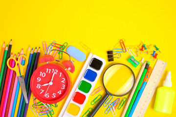 School supplies and stationery yellow background.Preparing child for school.